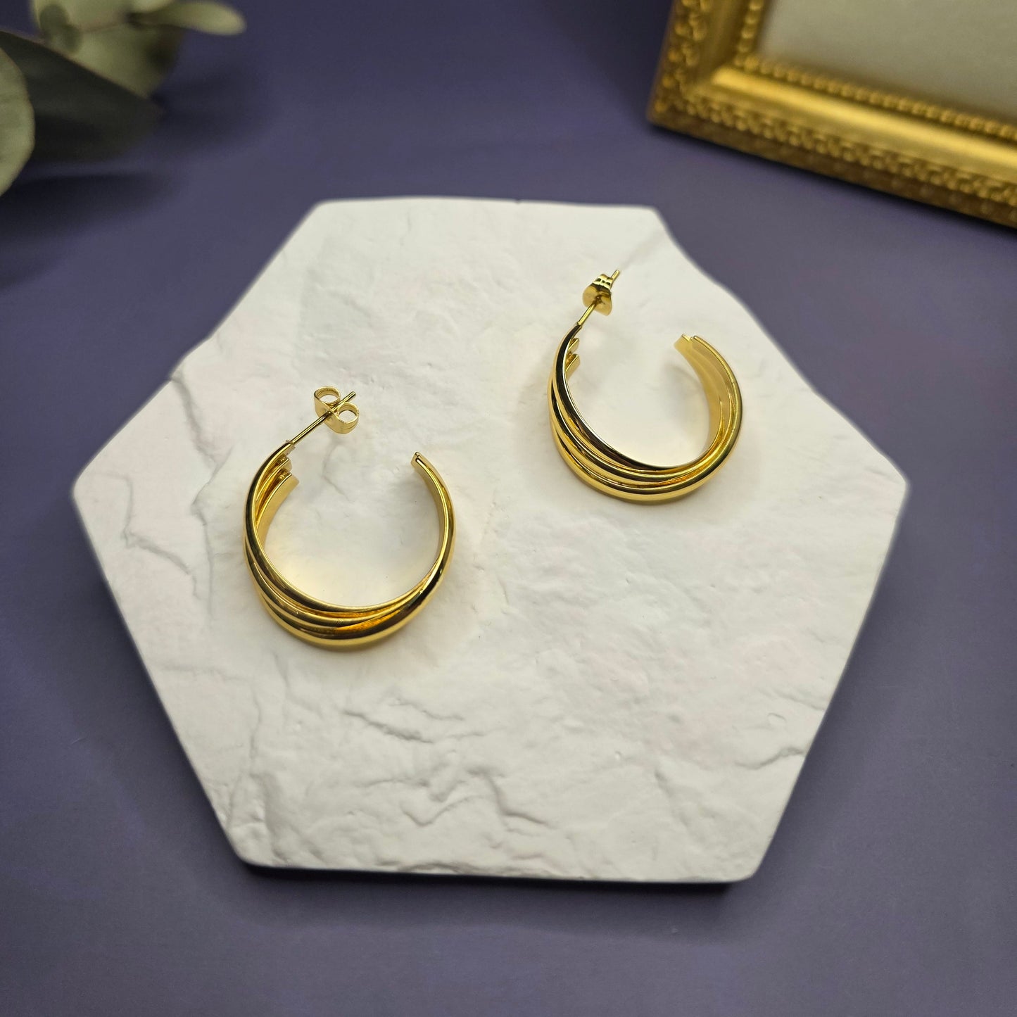 Gold Metric Tides Hoops on a textured stone flat lay — My Silver Lining.