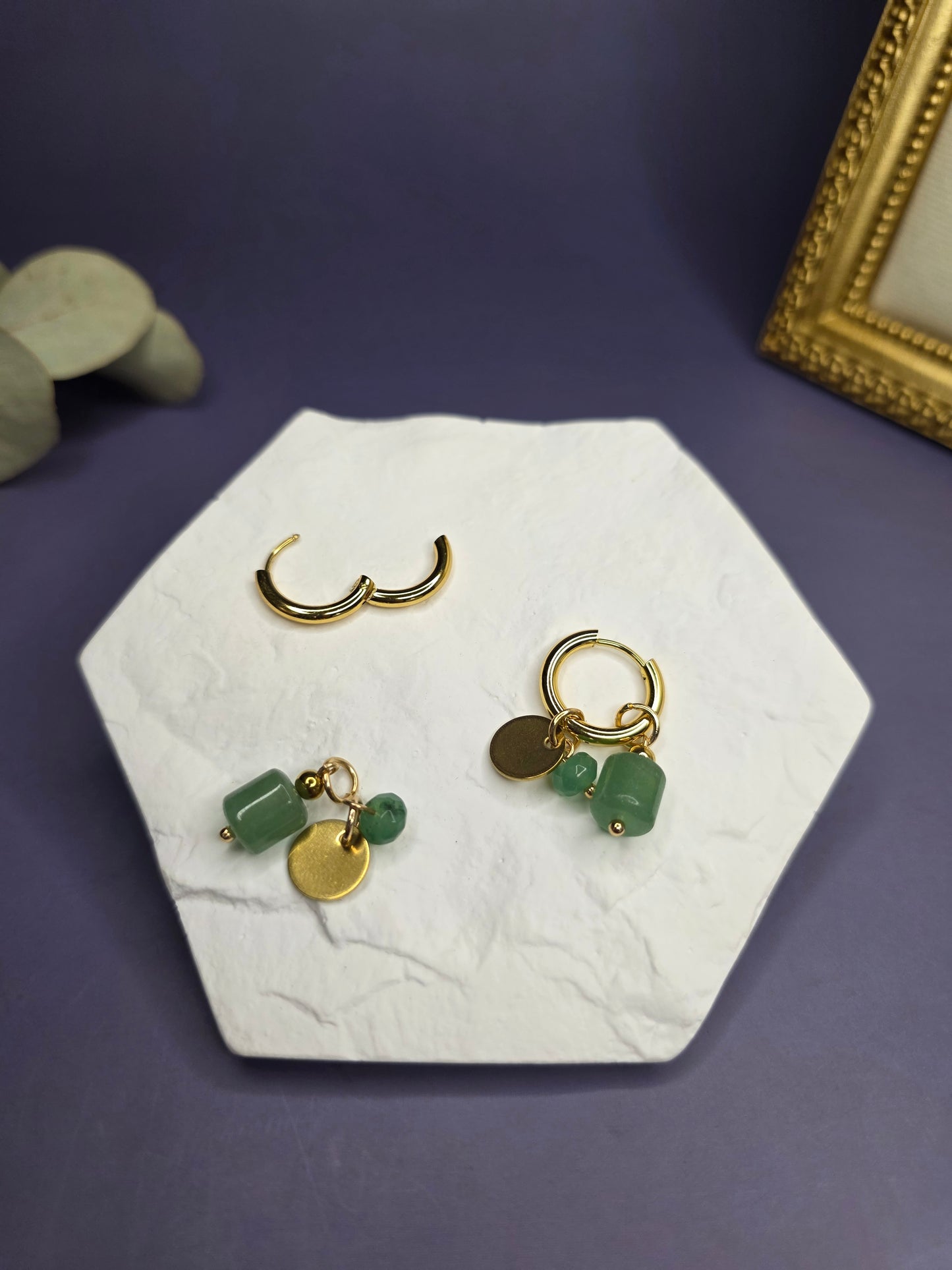 Rustic Olive Huggies shown on a white stone tray, demonstrating the removable green stone charms and the standalone gold huggie — My Silver Lining.