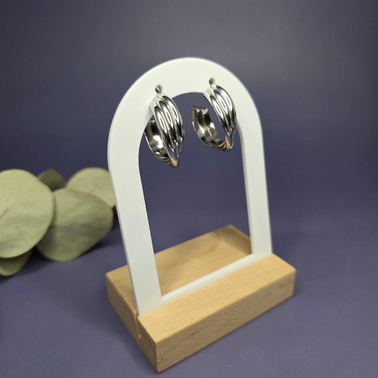 Angled shot of Silver Tide Hoops, displaying the depth and unique curvature of the layered bands — My Silver Lining.
