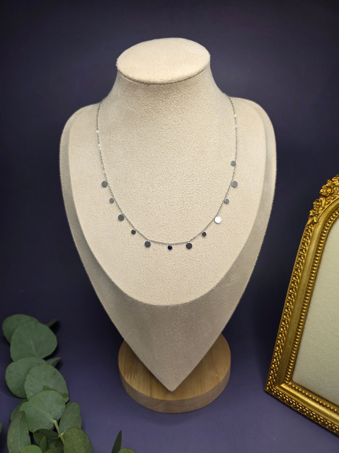 A Silver Dewdrop Necklace elegantly draped on a fabric mannequin bust, showcasing the adjustable 40+5cm fit and modern sophistication of My Silver Lining.
