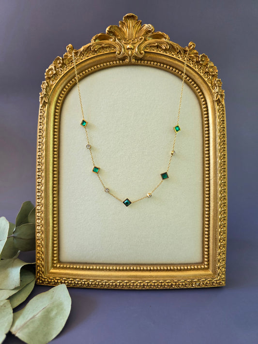 Emerald Glow Station necklace featuring green square-cut stones in a vintage gold frame. This waterproof and tarnish-resistant gold-plated necklace is perfect for elegant daily wear - My Silver Lining.