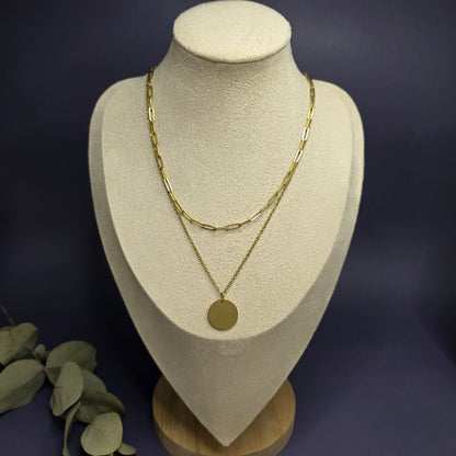 Optimized view of the Golden Horizon Layered Set on a jewelry bust, highlighting the 18K gold plated engravable 1.8cm disc pendant — My Silver Lining.