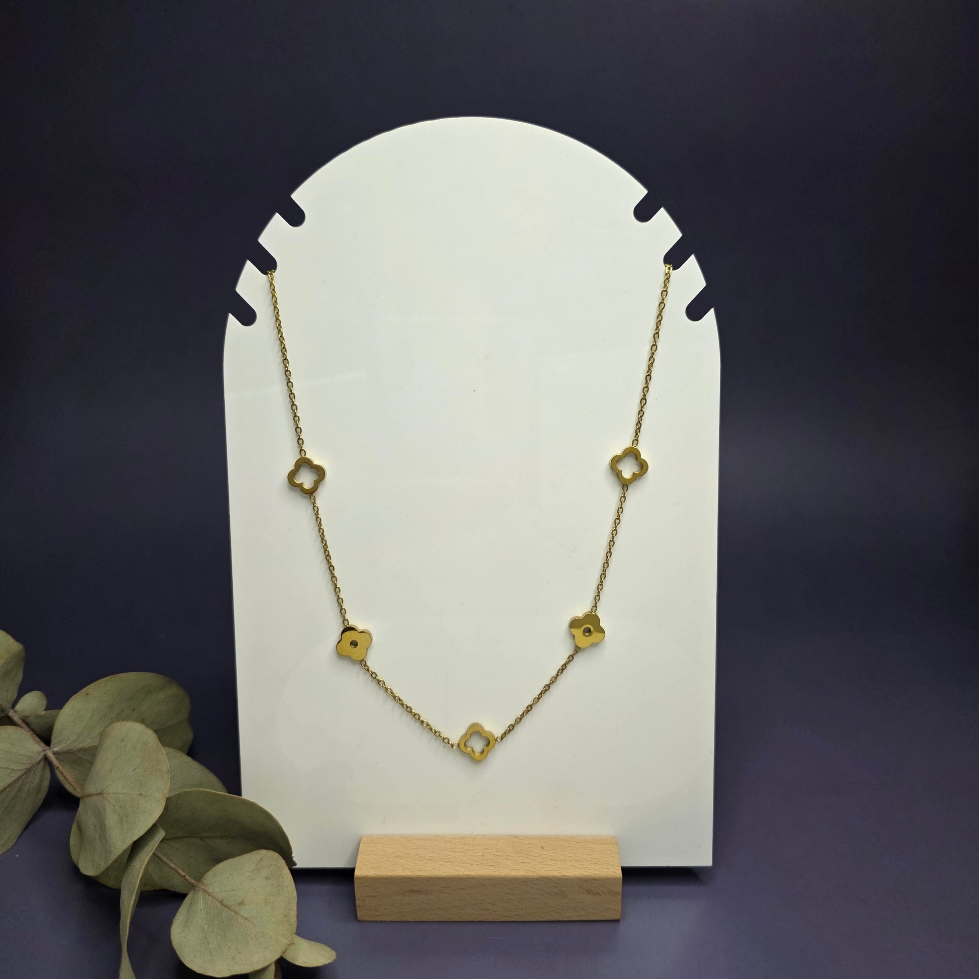 Angled shot of the Gold Lucky in Love necklace, showing the 40+5cm flat-link chain and 18k gold plated clover charm — My Silver Lining.