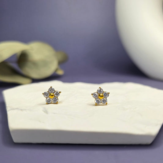 SEO optimized close-up of Modern Grace Floral Studs on a white stone, showing the sparkling synthetic zircon petals — My Silver Lining.