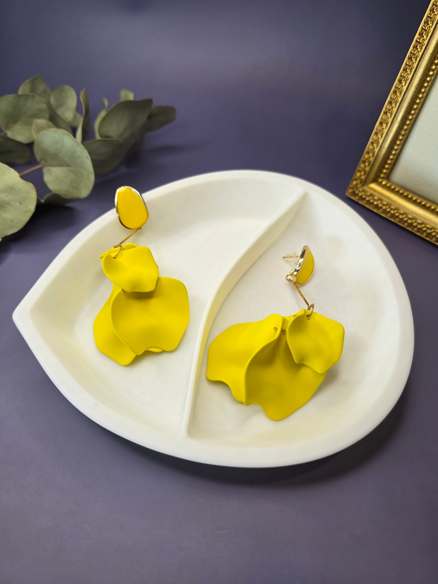 The French Riviera Petal Drop Earrings. Large, 9.2 cm long statement earrings featuring layered acrylic petals in a cascading floral design. Secured with a 316 Stainless Steel ear needle.