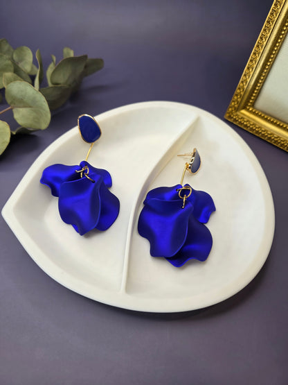 The French Riviera Petal Drop Earrings. Large, 9.2 cm long statement earrings featuring layered acrylic petals in a cascading floral design. Secured with a 316 Stainless Steel ear needle.