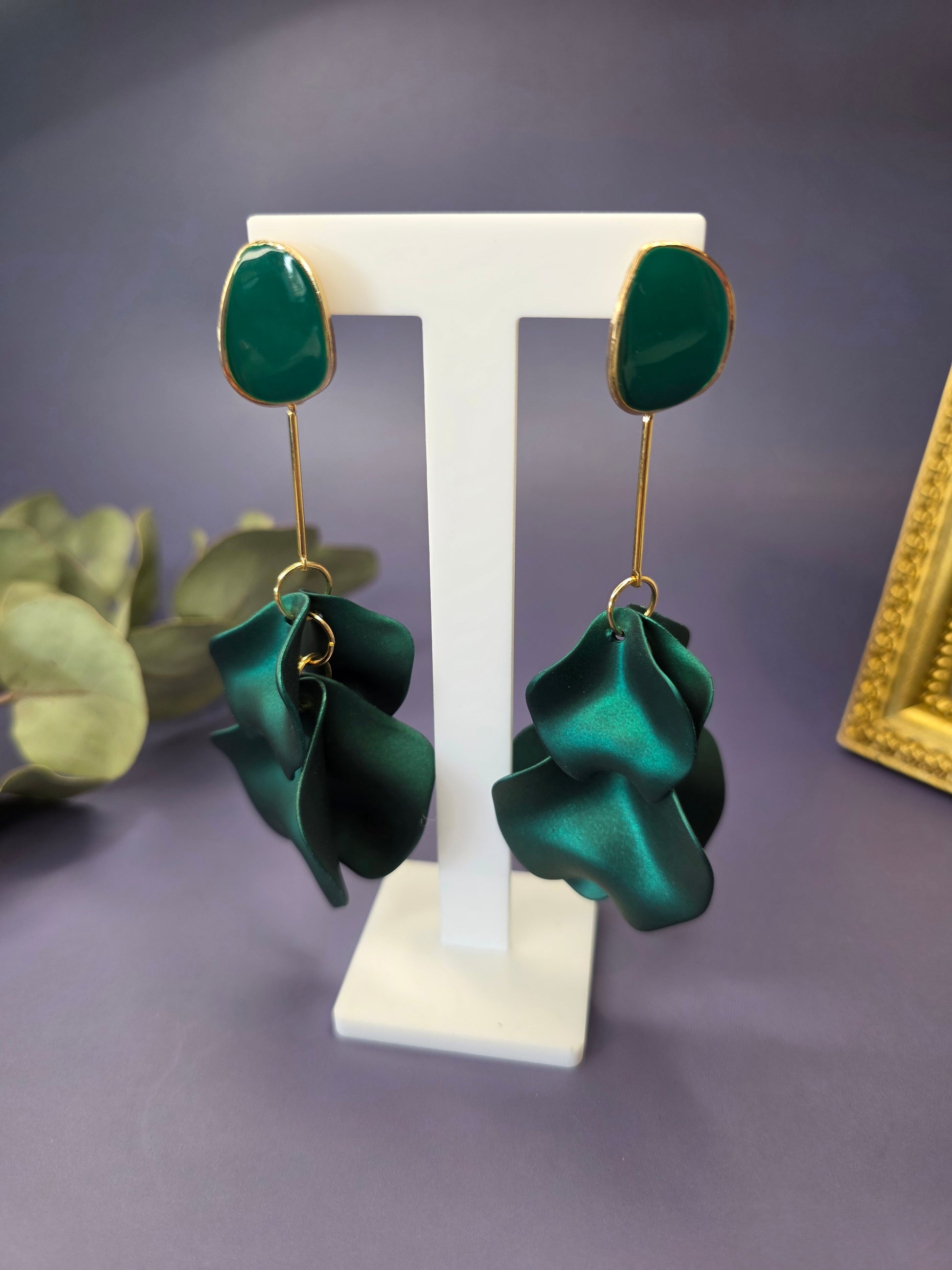 The French Riviera Petal Drop Earrings. Large, 9.2 cm long statement earrings featuring layered acrylic petals in a cascading floral design. Secured with a 316 Stainless Steel ear needle.