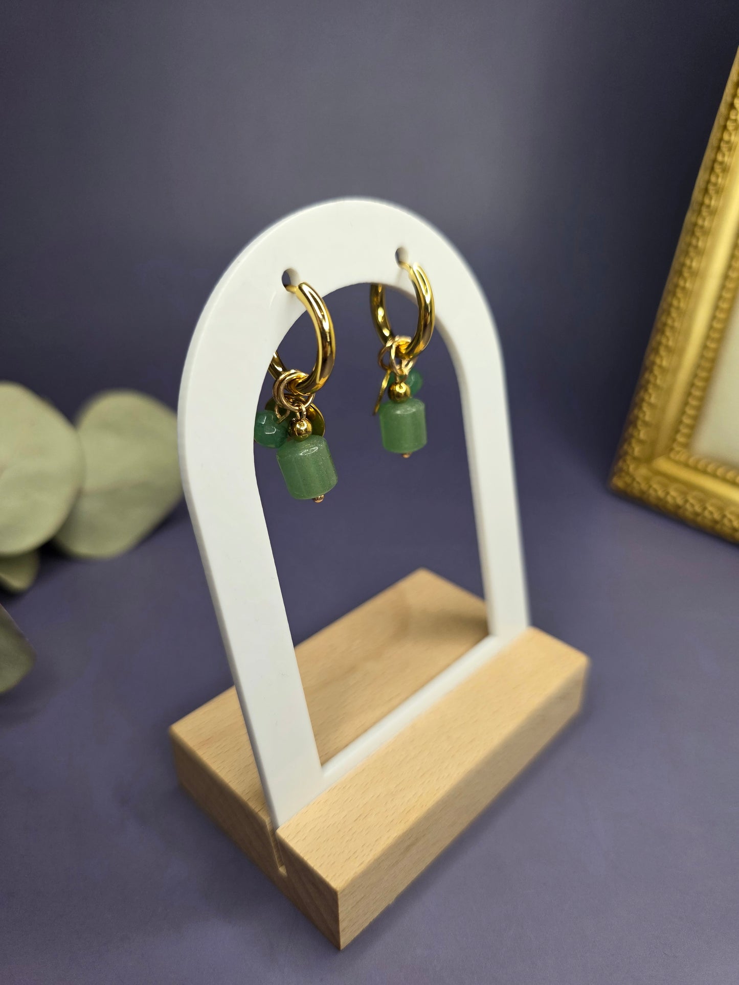 Side profile of Rustic Olive Huggies highlighting the natural texture of the green stones and the polished gold finish — My Silver Lining.