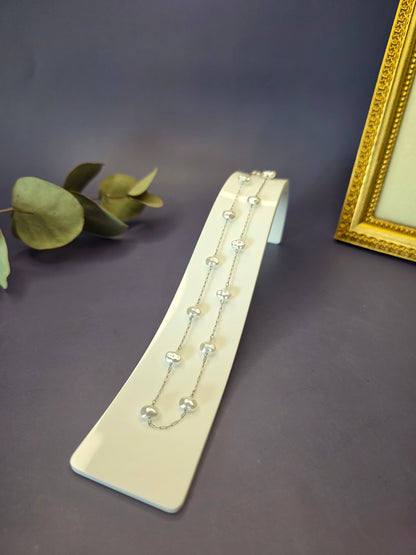 Close-up of the Silver Mist Pearl Necklace highlighting the lustrous faux pearls and high-quality silver stainless steel chain. This hypoallergenic and waterproof station necklace is designed for lasting modern sophistication - My Silver Lining.
