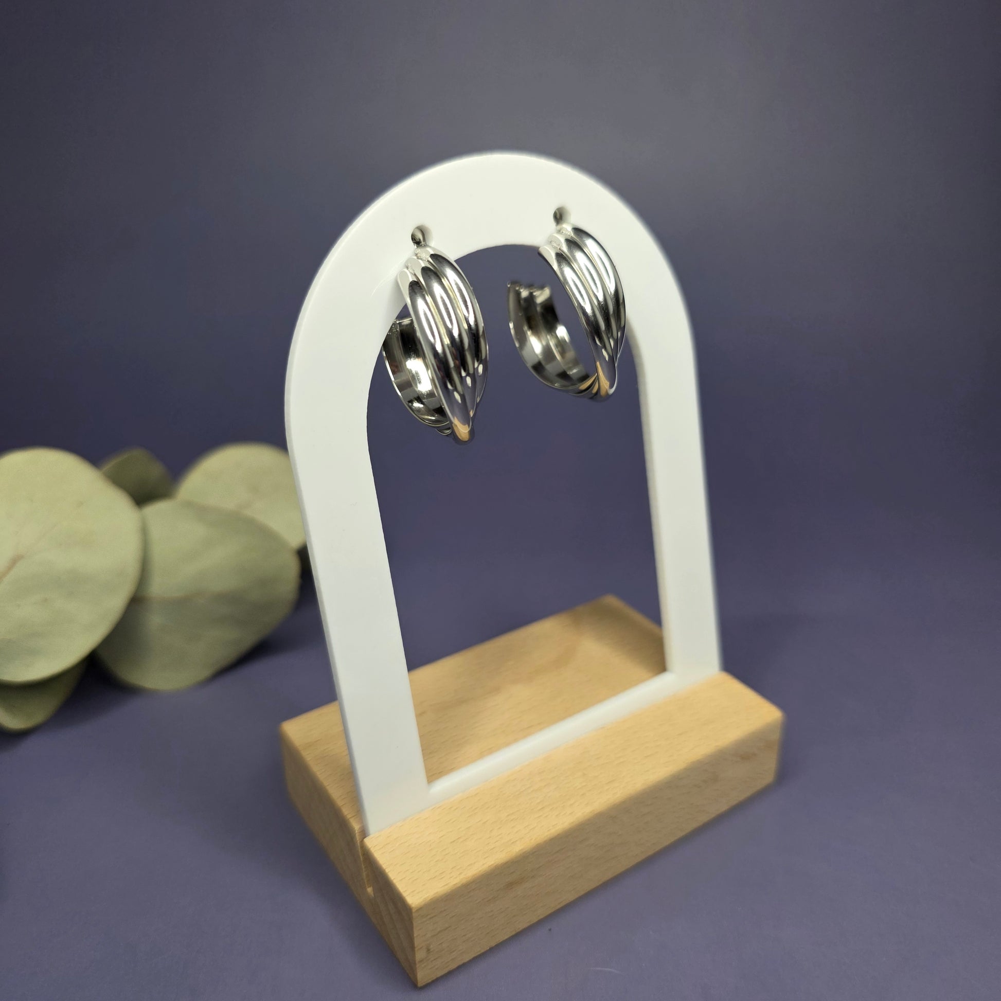 Angled shot of Silver Tide Hoops, displaying the depth and unique curvature of the layered bands — My Silver Lining.