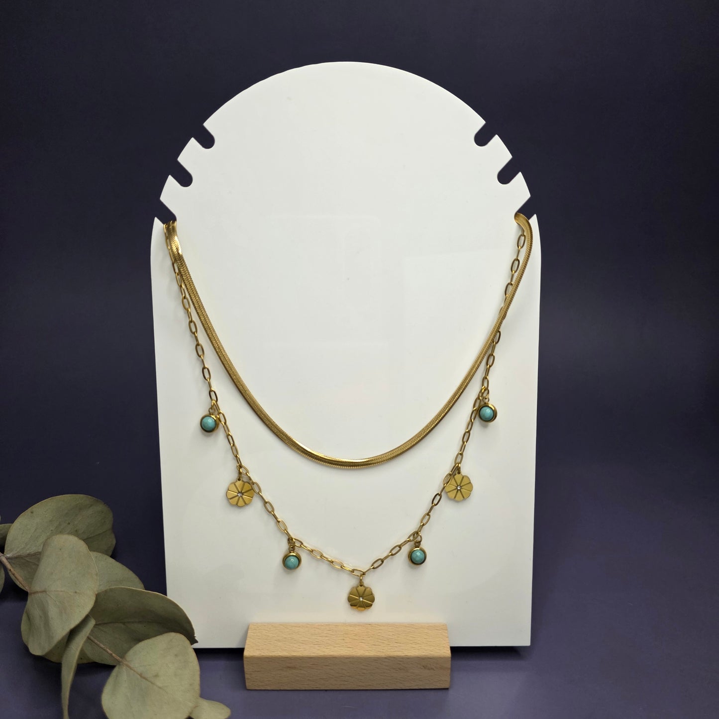 Optimized flat lay of the Desert Bloom necklace highlighting the 1cm flower pendants and 304 stainless steel construction — My Silver Lining.