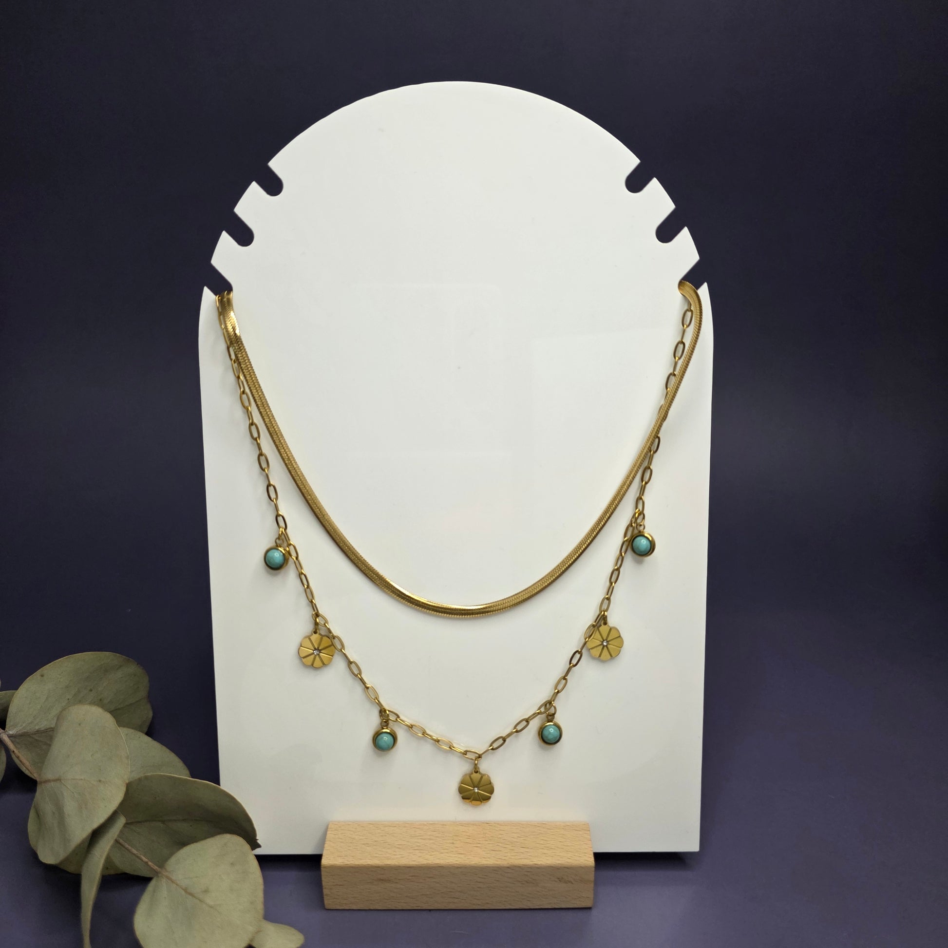 Optimized flat lay of the Desert Bloom necklace highlighting the 1cm flower pendants and 304 stainless steel construction — My Silver Lining.